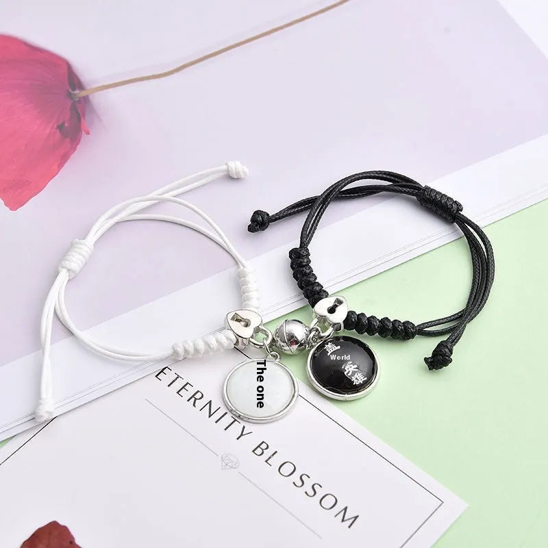 Magnetic couple bracelet pair with alloy electroplating in various designs including clover and crown patterns