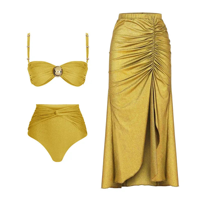 Women's yellow high-waist bikini two-piece swimsuit with a matching skirt laid flat.
