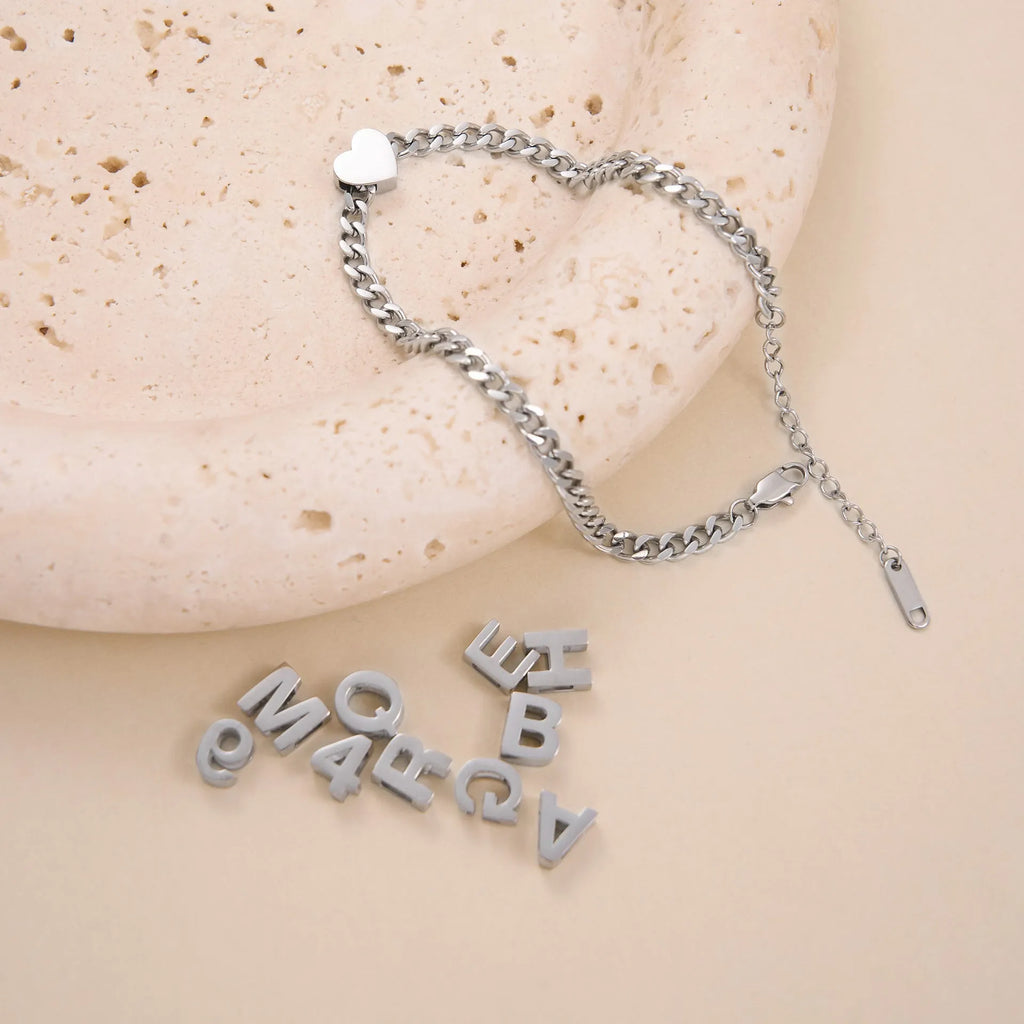 Titanium steel number and letter necklace with gold electroplated finish on grinding chain design