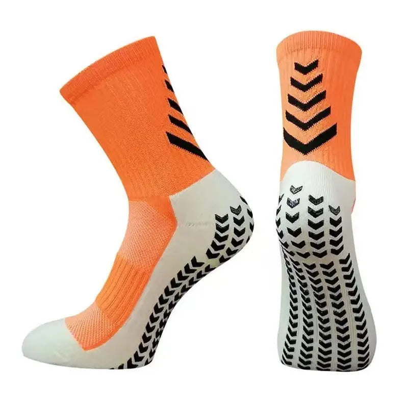 Men's mid-calf athletic socks with geometric patterns and non-slip silicone grips