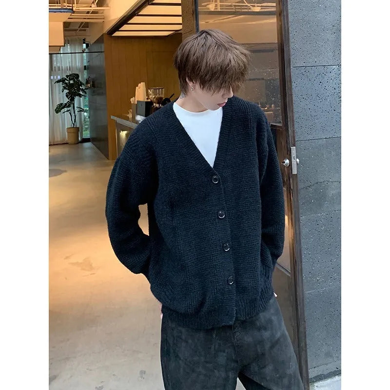 Men's loose fit casual cardigan sweater in army green, shown on a hanger.