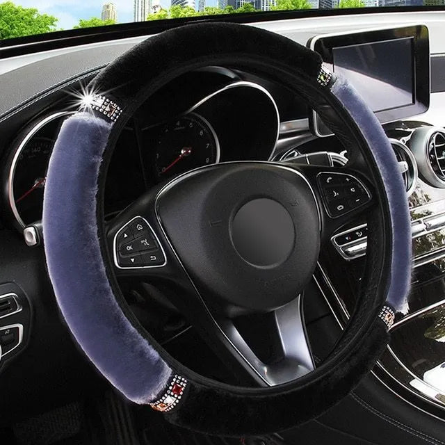 Short hair diamond plush elastic steering wheel cover in black on a car steering wheel