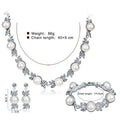 Three-piece jewellery set with rhinestone and pearl necklace, earrings, and bracelet in silver finish