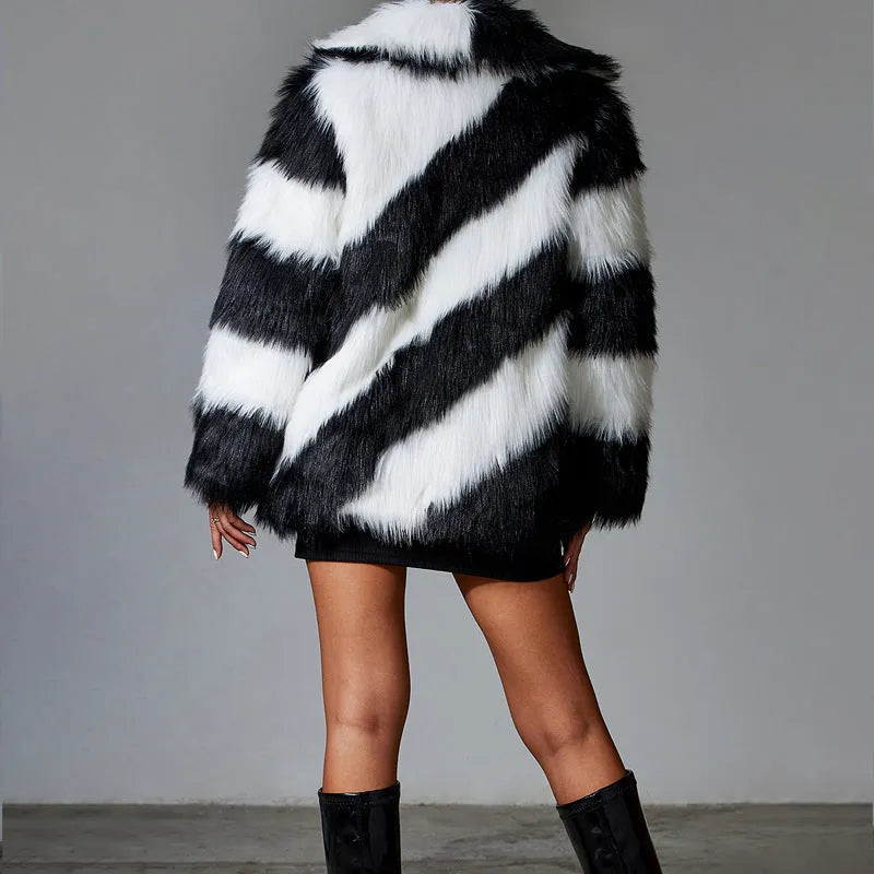 Women's lapel contrast colour coat with faux fur collar in picture colour, shown on model.
