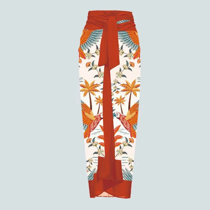 Women's white floral print one-piece swimsuit with matching wrapped skirt