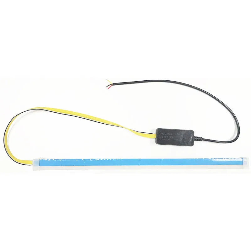 Flexible silicone car LED daytime running light strip with flowing turn signal animation mounted on headlight.
