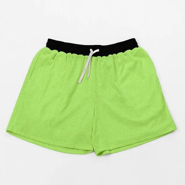 Men's solid colour mesh quick-drying sports shorts for running and fitness.