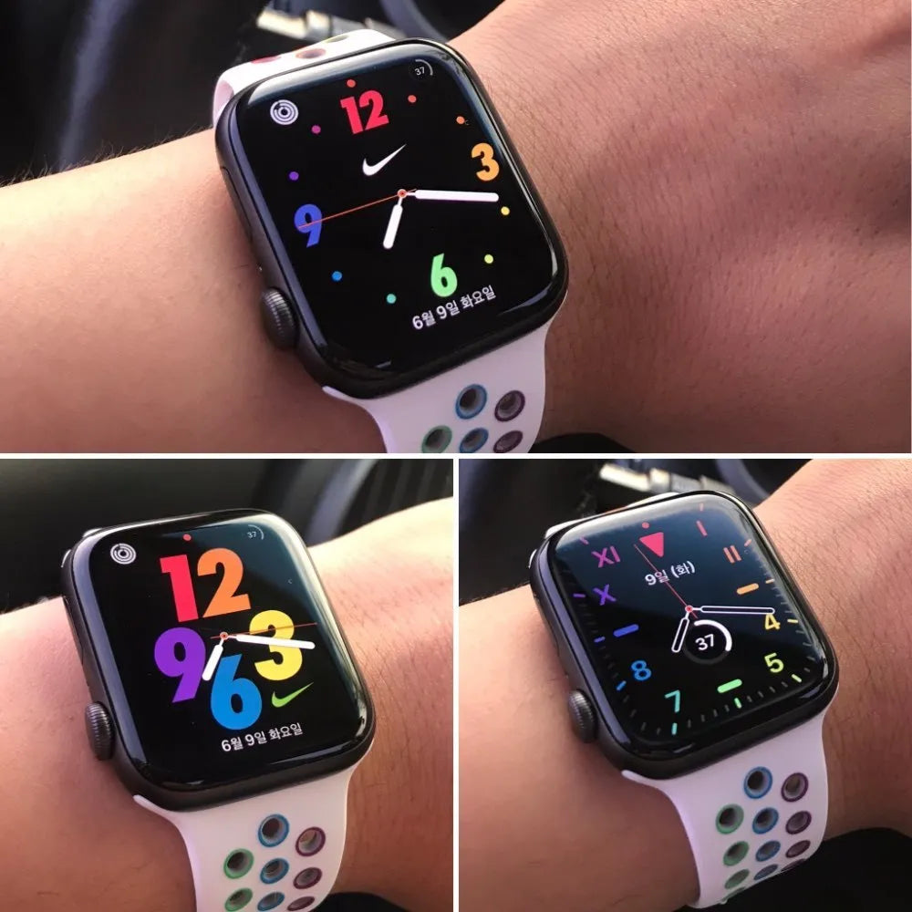 Adjustable silicone sports wristband strap in black, rainbow, or white with a buckle.