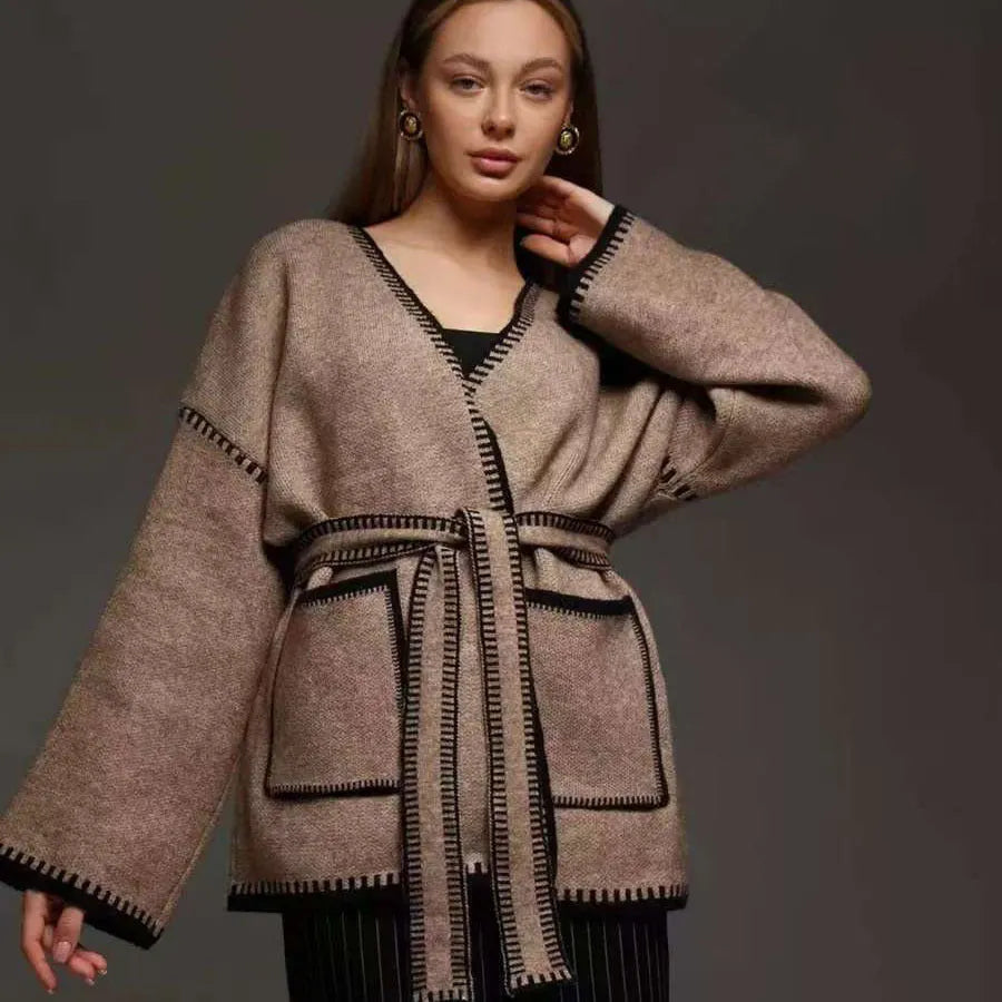 Lace-up front knitted cardigan in imitation cashmere fabric showing loose fitting design and long sleeves