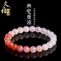 Natural gradient Yanyuan agate bracelet with geometric beads in salt source colour on a white background