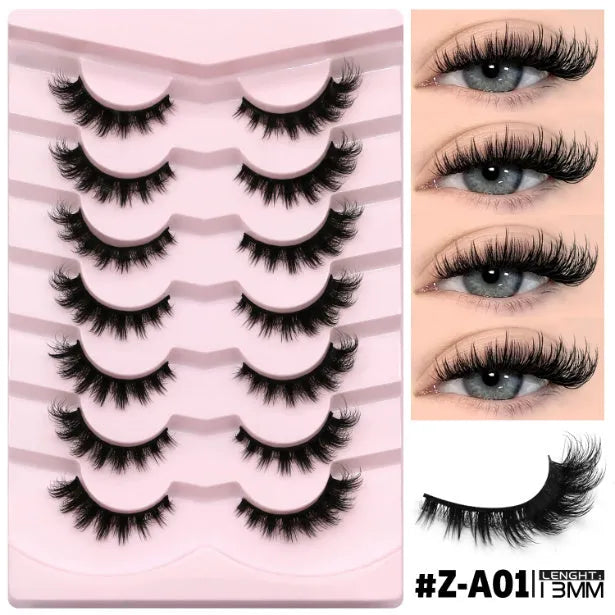 False eyelashes without eyeliner in thick natural long artificial fibre style with adhesive
