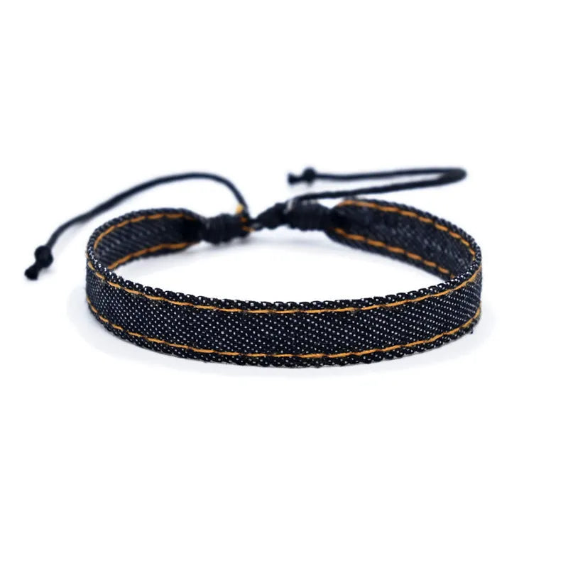 National style denim fabric unisex bracelet carrying strap in a selected colour.