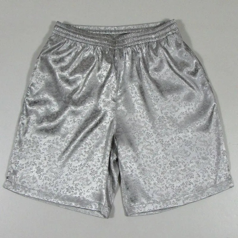 Men's traditional black Tang suit shorts with elasticated drawstring waistband laid flat