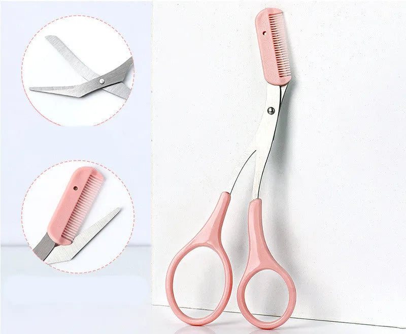 Close-up of a curved moon-shaped eyebrow trimming knife with a comb, in pink and white colours.