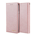 PU leather flip phone case in rose gold colour, shown open next to an iPhone, highlighting the interior card slot.