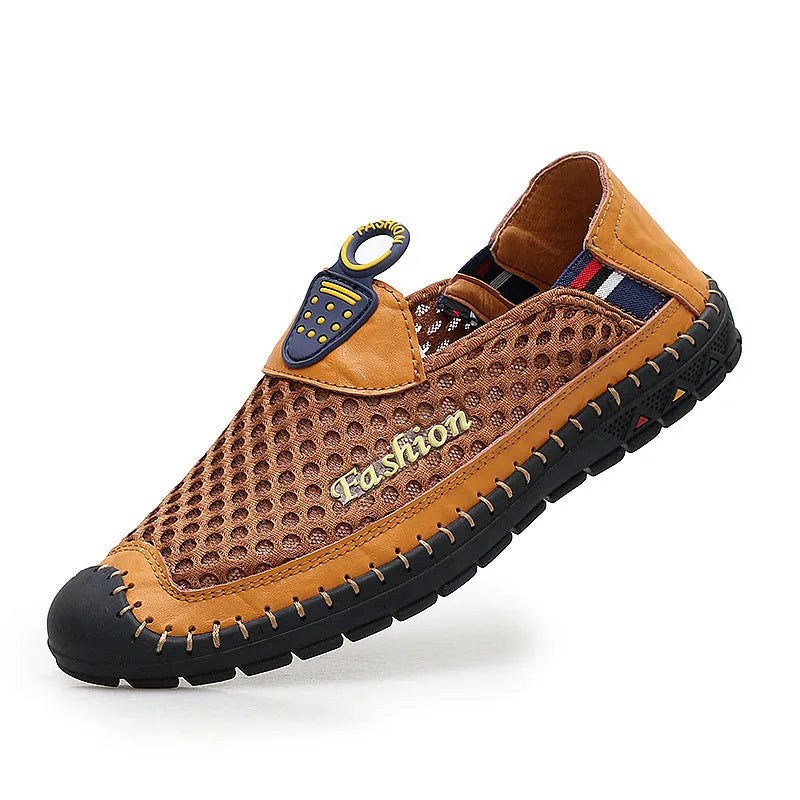 Men's brown mesh casual shoes with round toe and rubber sole on grey background