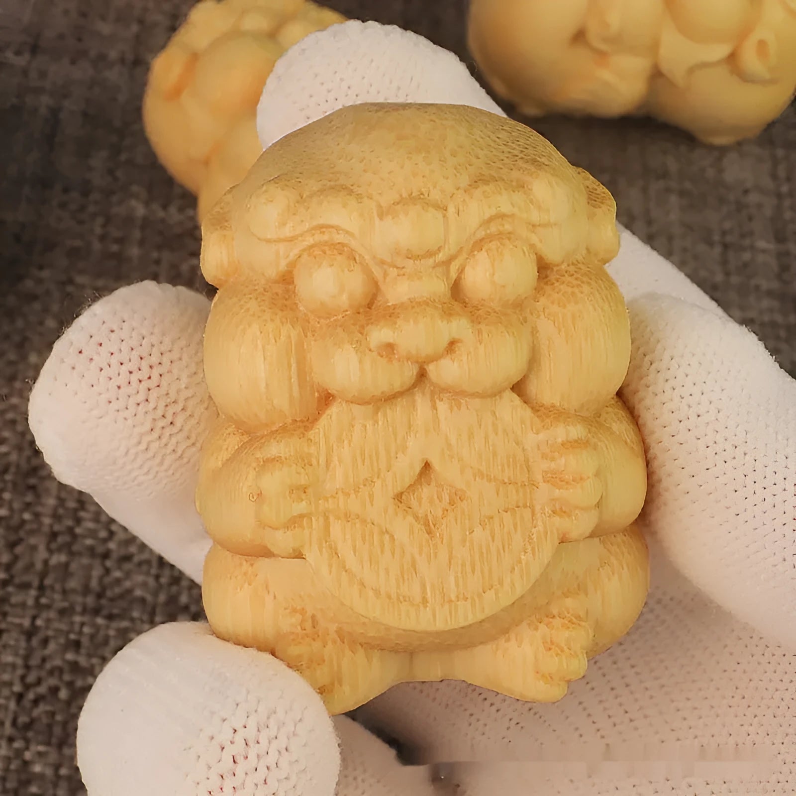 Solid bamboo money cat carving ornament measuring 4.5cm by 3.5cm