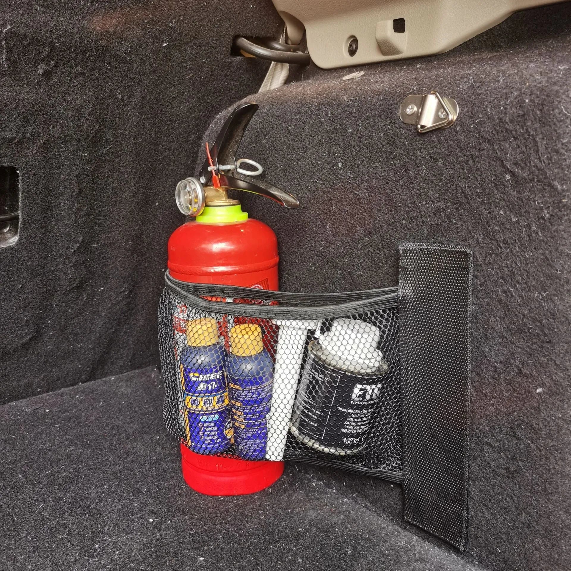 Black elastic polyester storage net for securing items in a car boot, shown in 20x35cm and 20x45cm sizes.