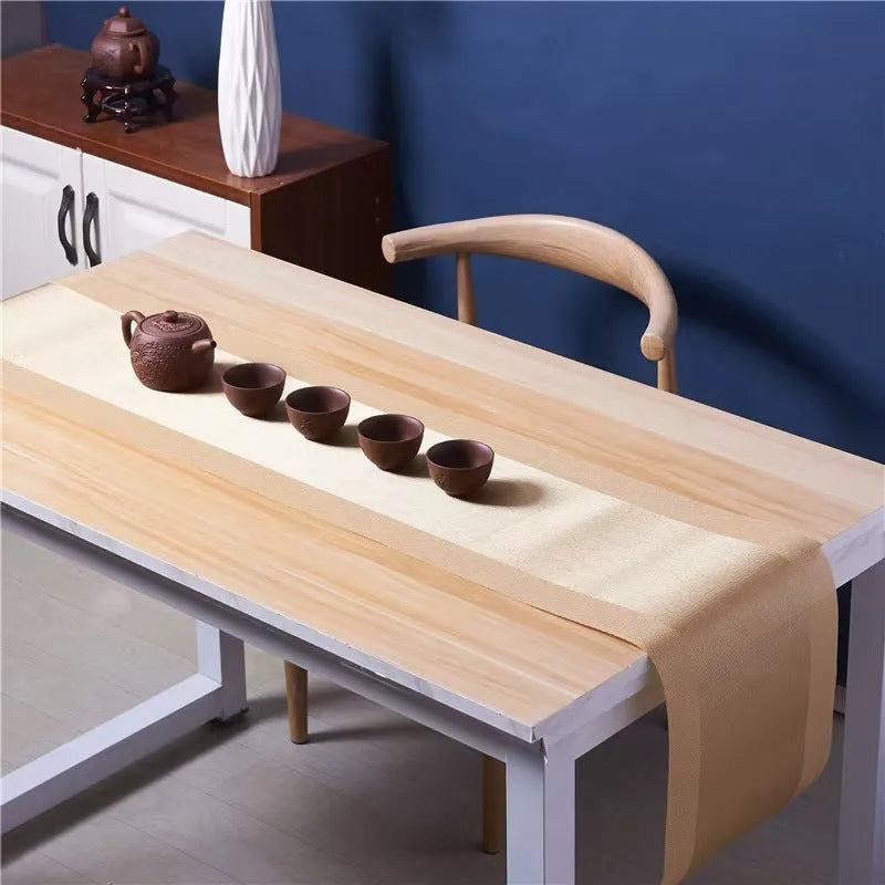 Non-slip PVC place mat in modern simple style, showing gradient bamboo black colour option on a kitchen counter.
