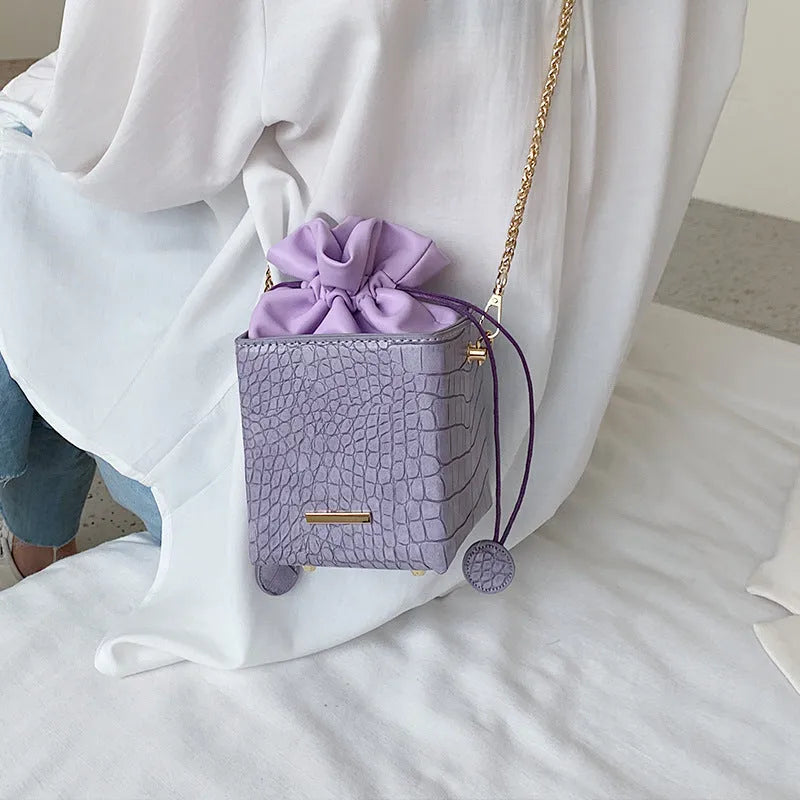 Small Korean-style chain messenger bag with drawstring closure in multiple colour options