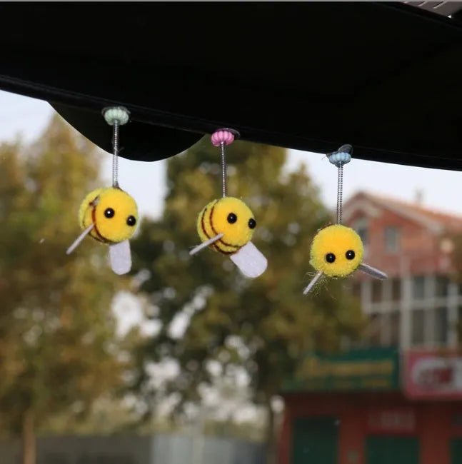 Swing Spring Bee car dashboard decoration showing cartoon bee design on fur ball material