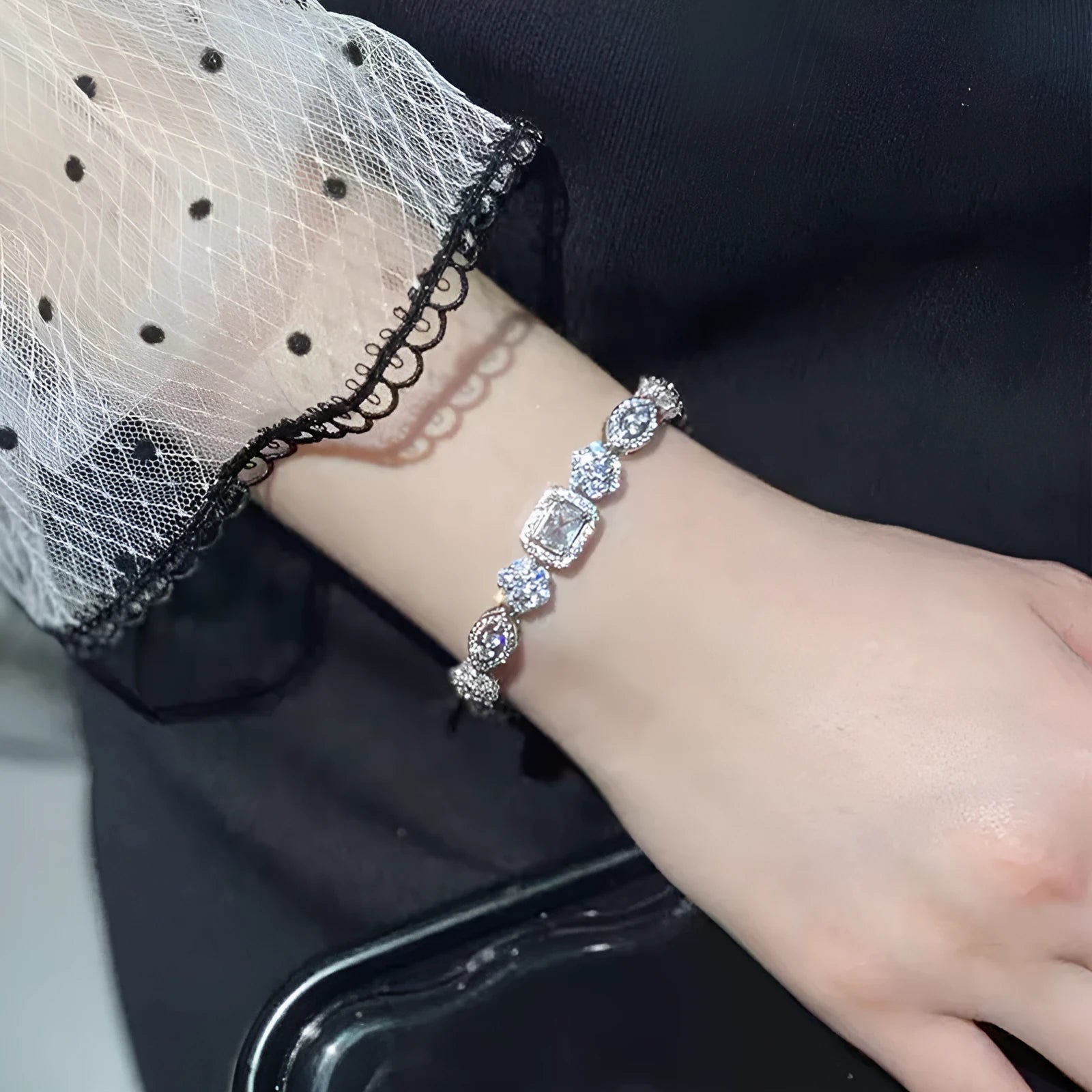 Women's white gold plated geometric bracelet with zircon stones in two length options.