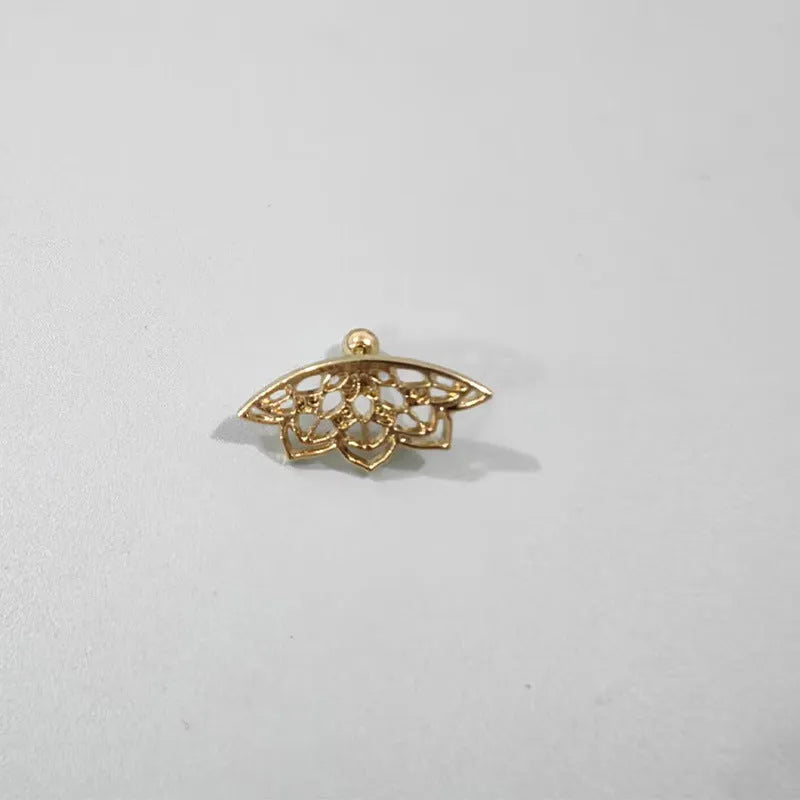 Spider web design metal stud earrings in gold or silver electroplated finish.
