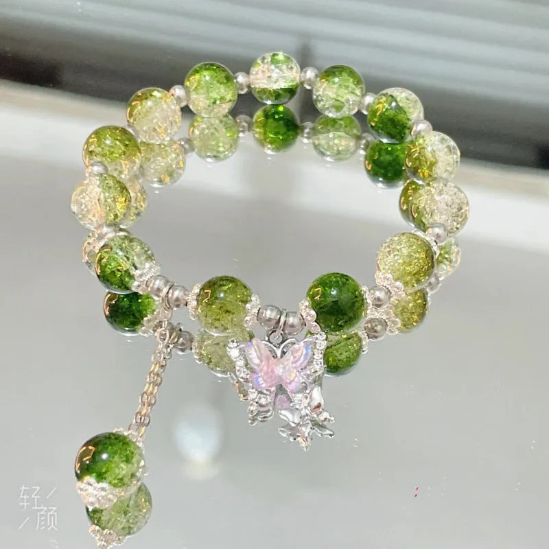 Handmade Chinese style glass bracelet with bamboo joint beads in a red Lvzhu Duobao design.