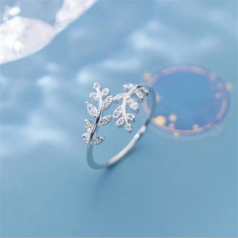 Women's copper branch leaf ring with geometric design in gold or silver electroplated finish