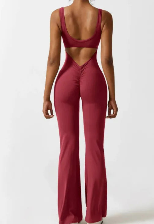 Women's black yoga bodysuit with hollow seam design and built-in chest pads