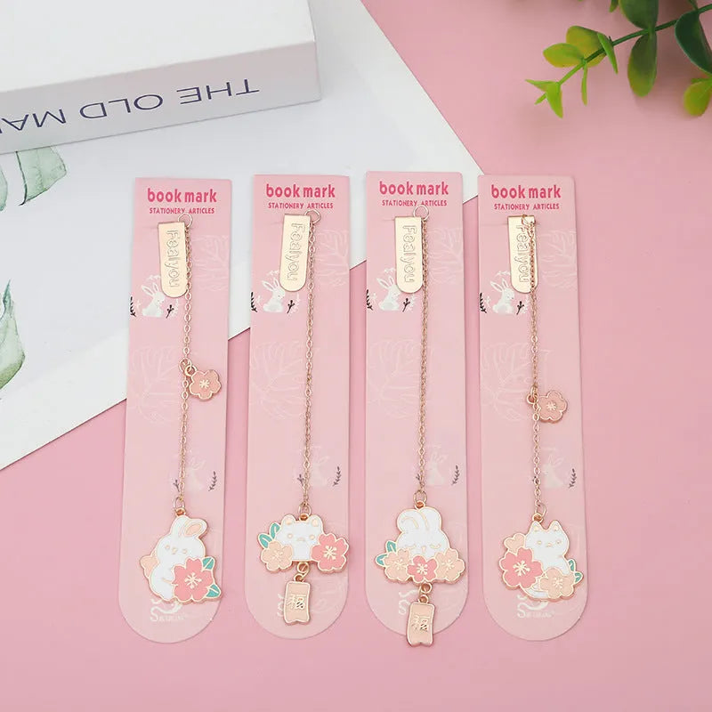 Metal pendant bookmark with cherry blossom cartoon cat design and matching book holder