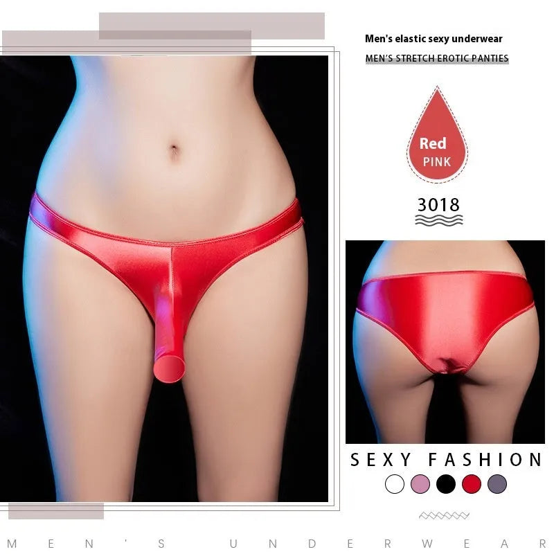 Men's shiny nylon T-back low waist underwear in black, shown on a model.