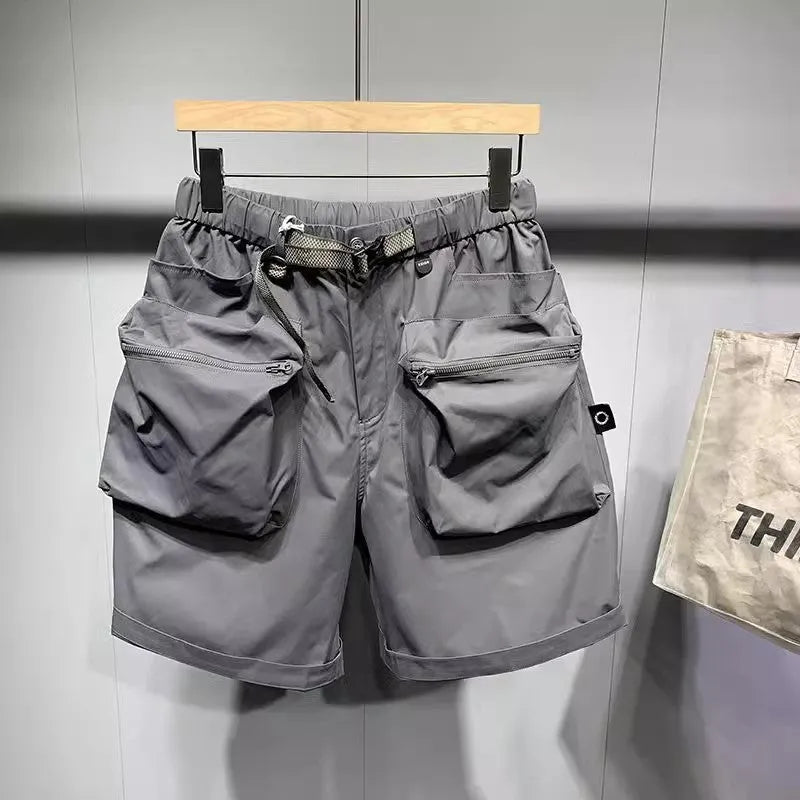 Men's loose fit work shorts in black or grey with pockets and non-iron treatment