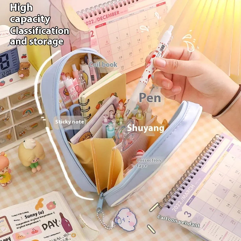 Large transparent PVC pencil case with cartoon bear, rabbit, and dog designs for student stationery.