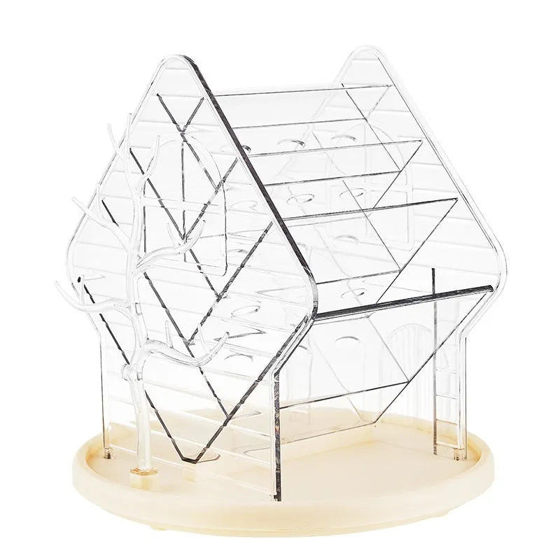 Rotating clear plastic cosmetics storage box on a counter, showing 360-degree spin function.