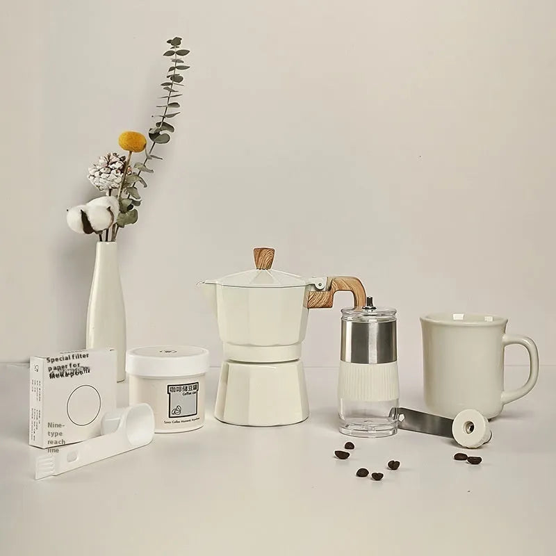 Manual grinding machine set six-piece moka pot kit in beige with grinder, cup, jar, brush, spoon and filter paper