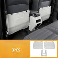 Three leather anti-kick pads for Mitsubishi Outlander seat and console protection.