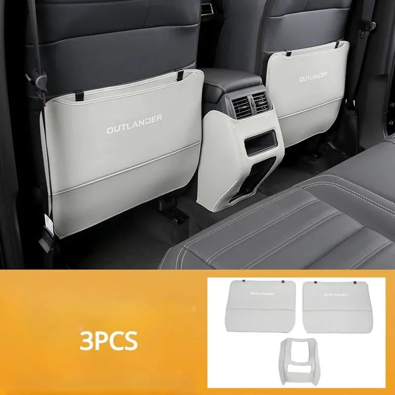 Three leather anti-kick pads for Mitsubishi Outlander seat and console protection.