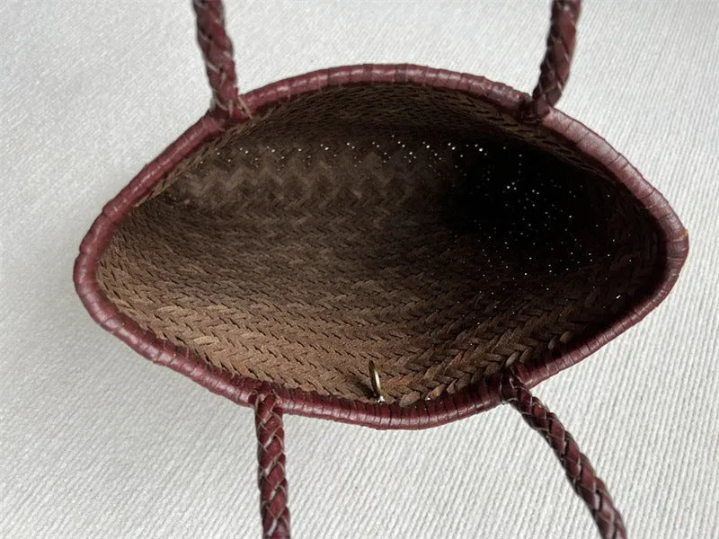 Brown handmade woven leather tote bag with outer pocket