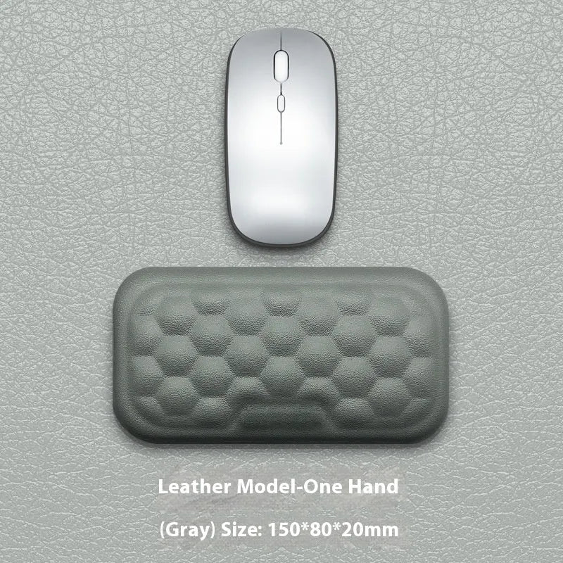 Memory foam mouse wrist rest pad with silicone base in black cloth cover option on desk