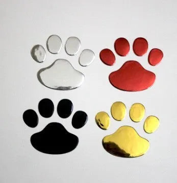 Pair of red dog footprint car stickers in a hand-shaped brush style on a white background.