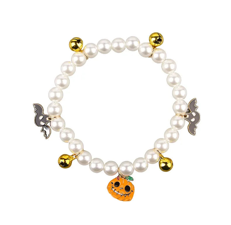 Halloween cat collar with simulated pearl necklace decoration showing pumpkin print patterns