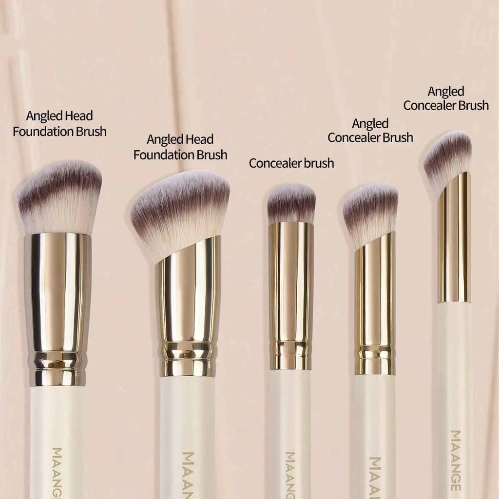 Five apricot coloured makeup brushes with synthetic bristles including angled blusher brush