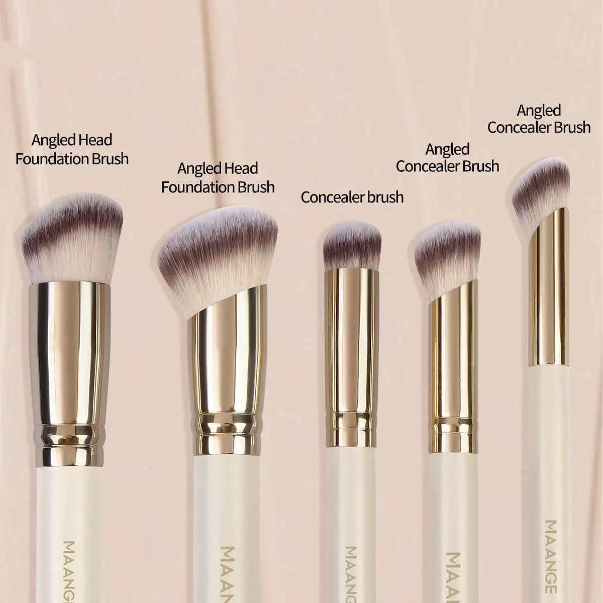 Five apricot coloured makeup brushes with synthetic bristles including angled blusher brush
