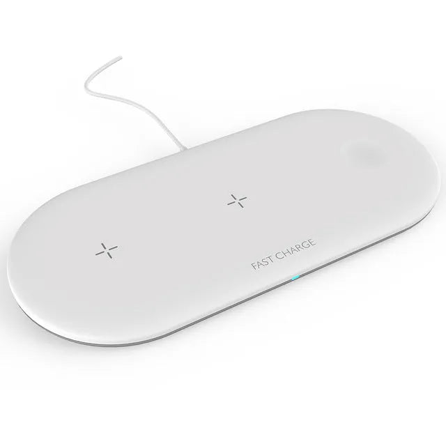 White 3-in-1 desktop wireless charger for Apple iPhone, watch and headphones on a wooden desk