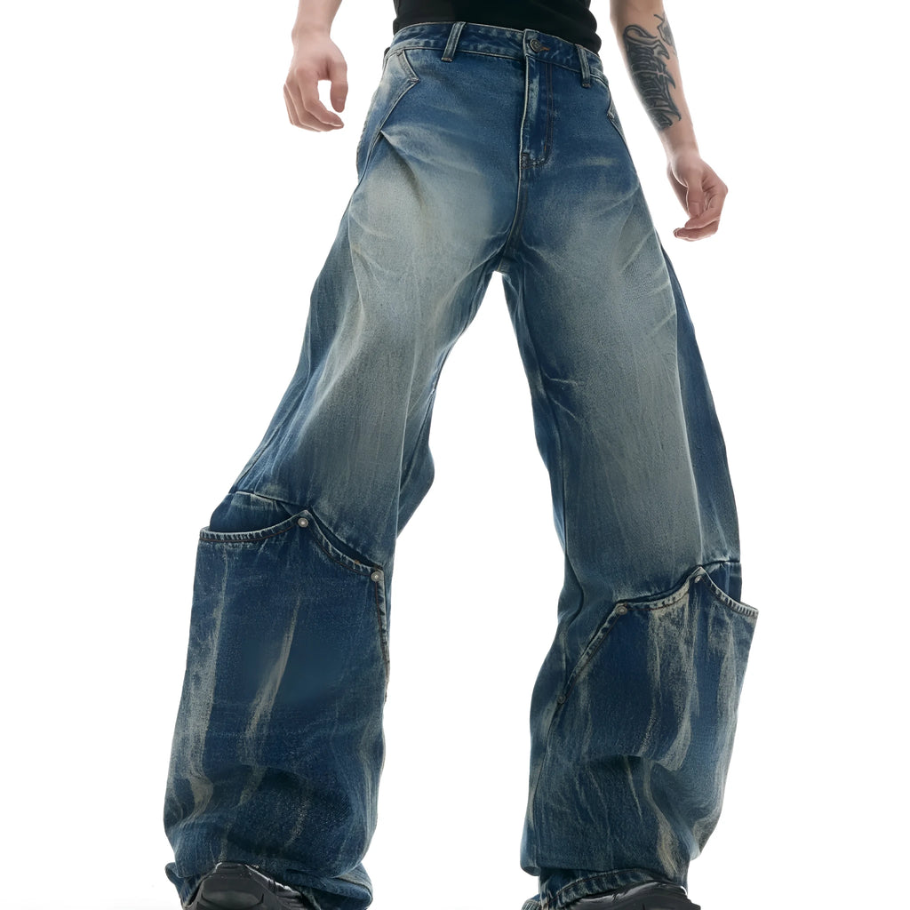 Men's retro washed burst pattern curved knife jeans in verdant blue colour showing loose fit design