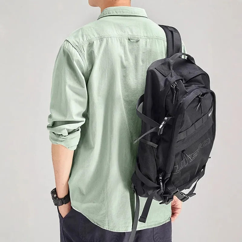 Man wearing loose fit long sleeve shirt overalls in cardigan style, made from polyester fabric