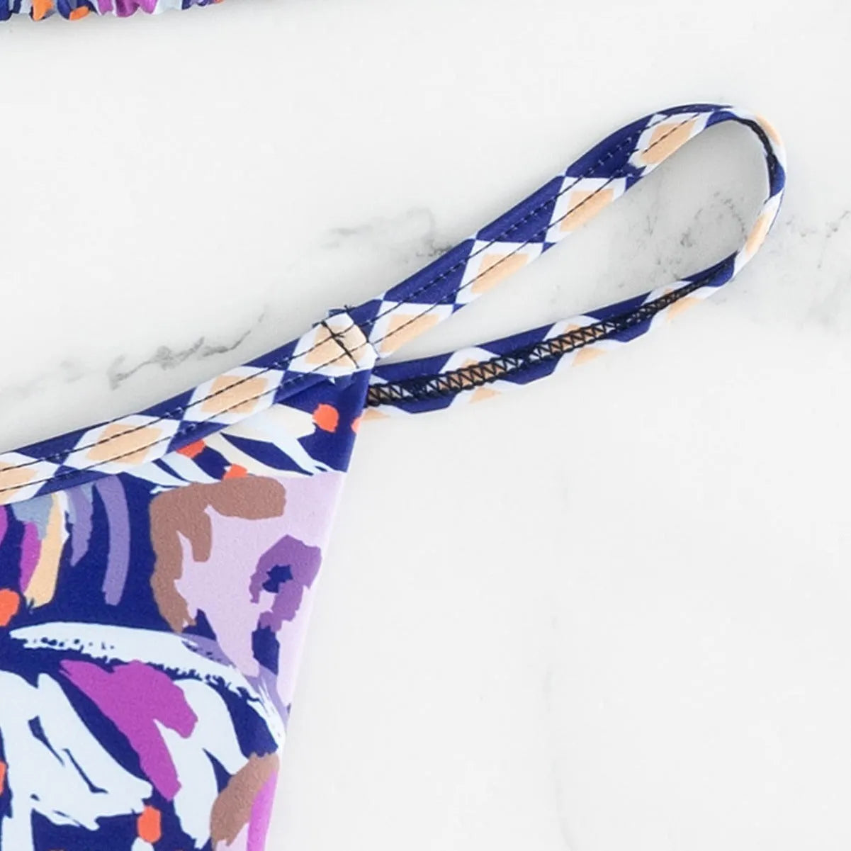 Women's floral print triangle bag swimsuit with briefs cut and polyester lining