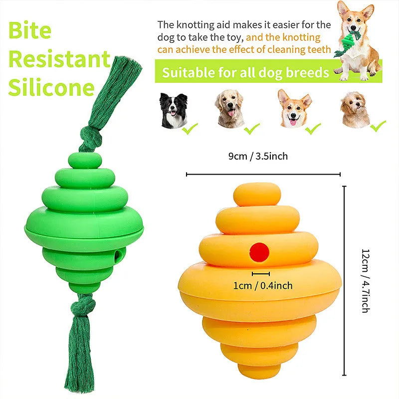 Large green and yellow silicone dog toy with a knotted rope and hollow ball for food dispensing.
