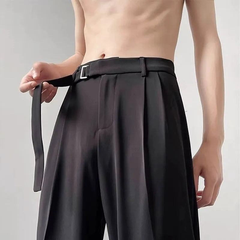 Black wide leg trousers with straight leg opening and loose fit casual style